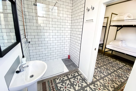 clean bathroom in eco hostal