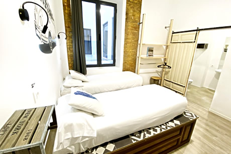 sapcious roomwith double beds in eco hostel