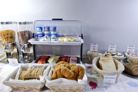 selection of breads and yogurts at hostel nest style granada