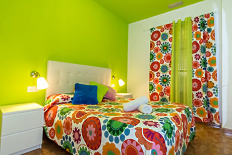 modern green room at the hostel nest style granada
