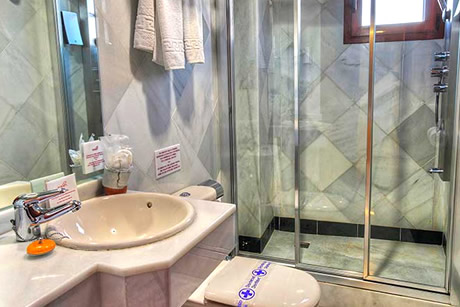 marble bathroom and glass shower in the arabeluj hotel