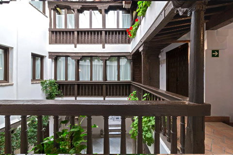 windows and wooden beams in the capital house