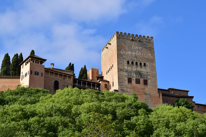 view of the alhambra towers from paseo de los tristes