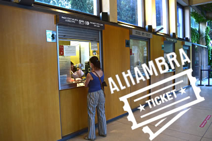 stand in front of the alhambra with the prices