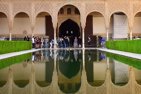 reflection of the arches in motionless water