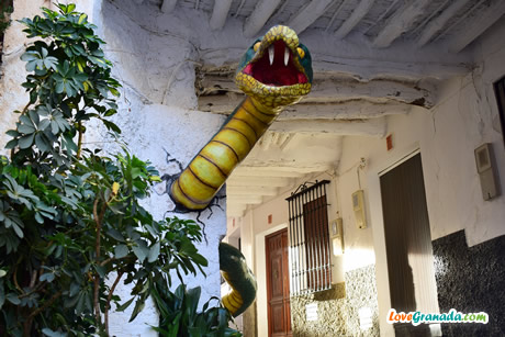 maleficent snake leaving the house