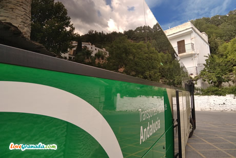 a bus heading to pitres at the bubion stop
