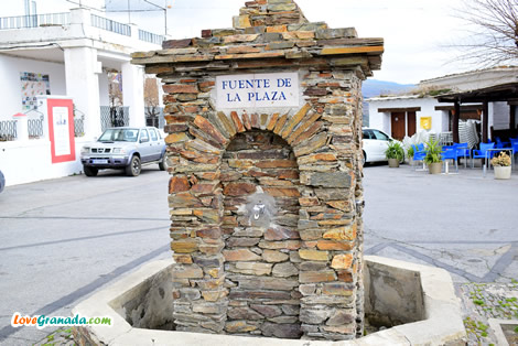fountain in the central square of pitres