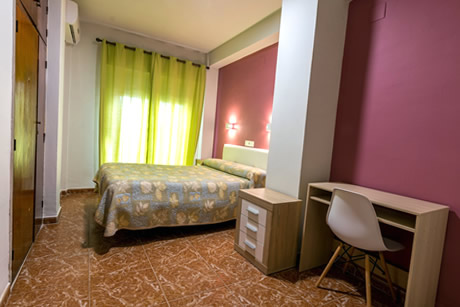 nice double bed in hostel rocamar in almuñecar