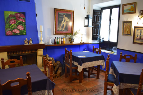 chimney and blue walls of the geraneos restaurant