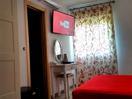 bright room in hostel san sebastian with wardrobe