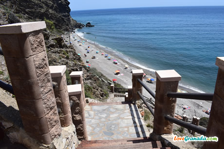 stairs down to the joya beach of granada