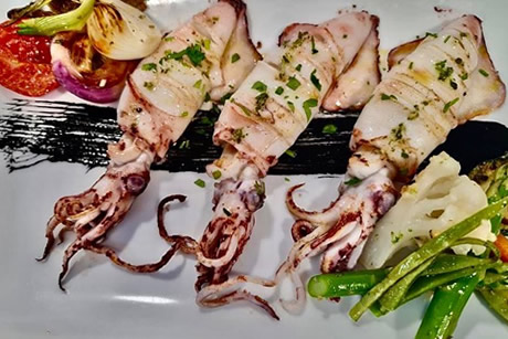 grilled squids in bola marina