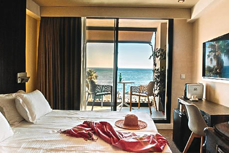 beautiful room with balcony in the hotel peña parda bay in la herradura
