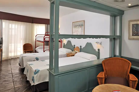 double room with huge bed and table in hotel tryp de los fenicios in la herradura