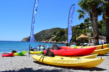 several kayaks in the herradura beach in granada province