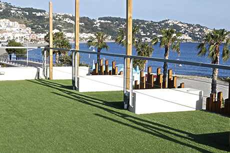 terrace with artificial green grass and views of the costa tropical