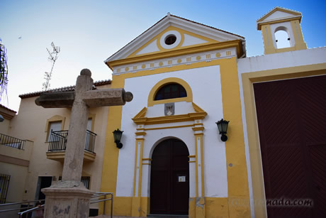 carmen church with cross in front of it in motril