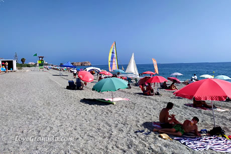 umbrellas next to the sea on guardia beach 