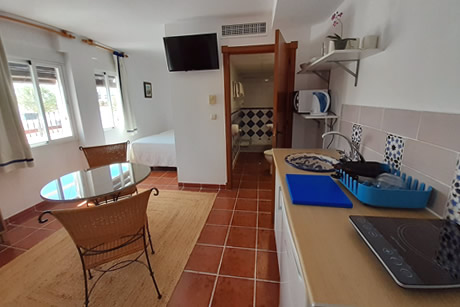 general view of the kitchen in hostal san juan