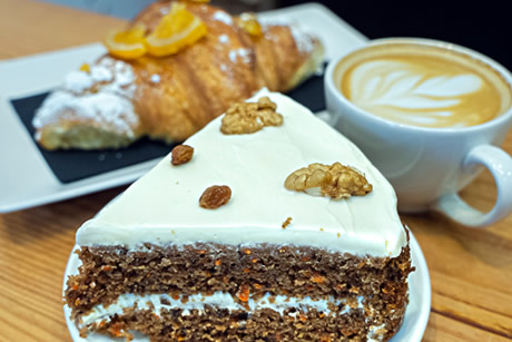 minuit pan cafe breakfast selection of cake, cafe and croissants