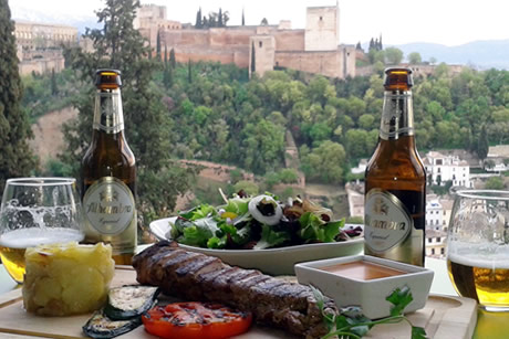 table in carmen verde luna with view of the alhambra