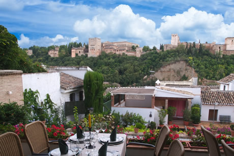 restaurant in granada with the alhambra in the background
