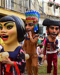 women dressed flamenco dresses in san cecilio granada feast