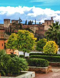 alhambra decorations that represent arab history of granada and view of albaicin from windows