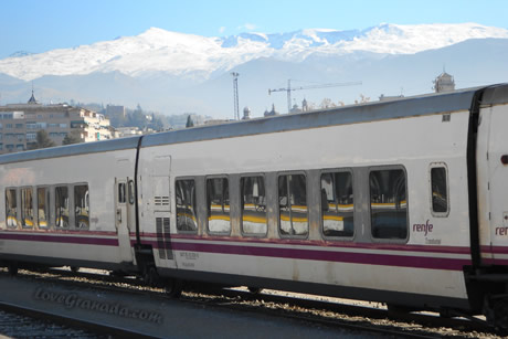 train and sierra nevada in background in granada train station