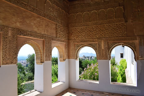 view of granada through the arches of the generalife