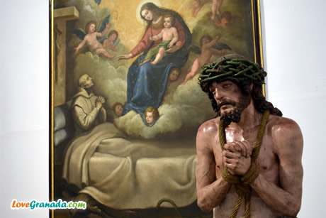 christ statue and virgen painting