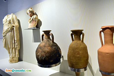 roman sculptures and jars