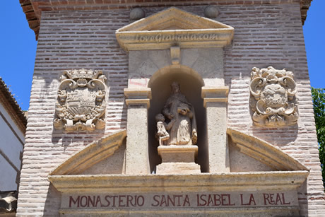 upper part of the entrance gate to isabel real monastery