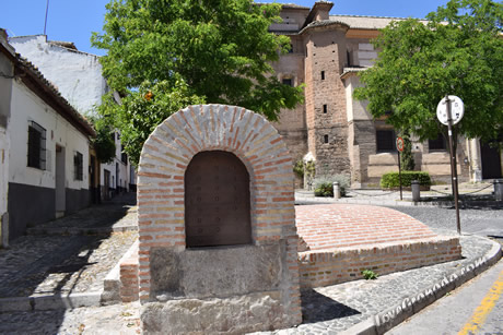 well entrance near salvador church in granada