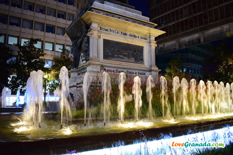 colourful fountains at night at plaza isabel catolica