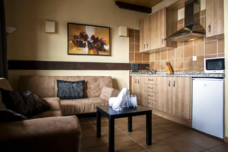 living room with views of the mountains in boabdil