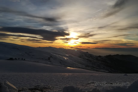 view of the mountains of sierra nevada illuminated at night