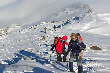 couple having fun with snowshoes