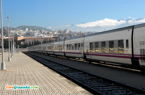 granada malaga train with sierra nevada behind