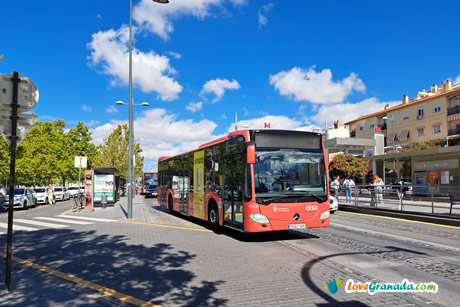 city bus in front of bus station