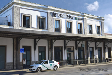 taxi in front of train station